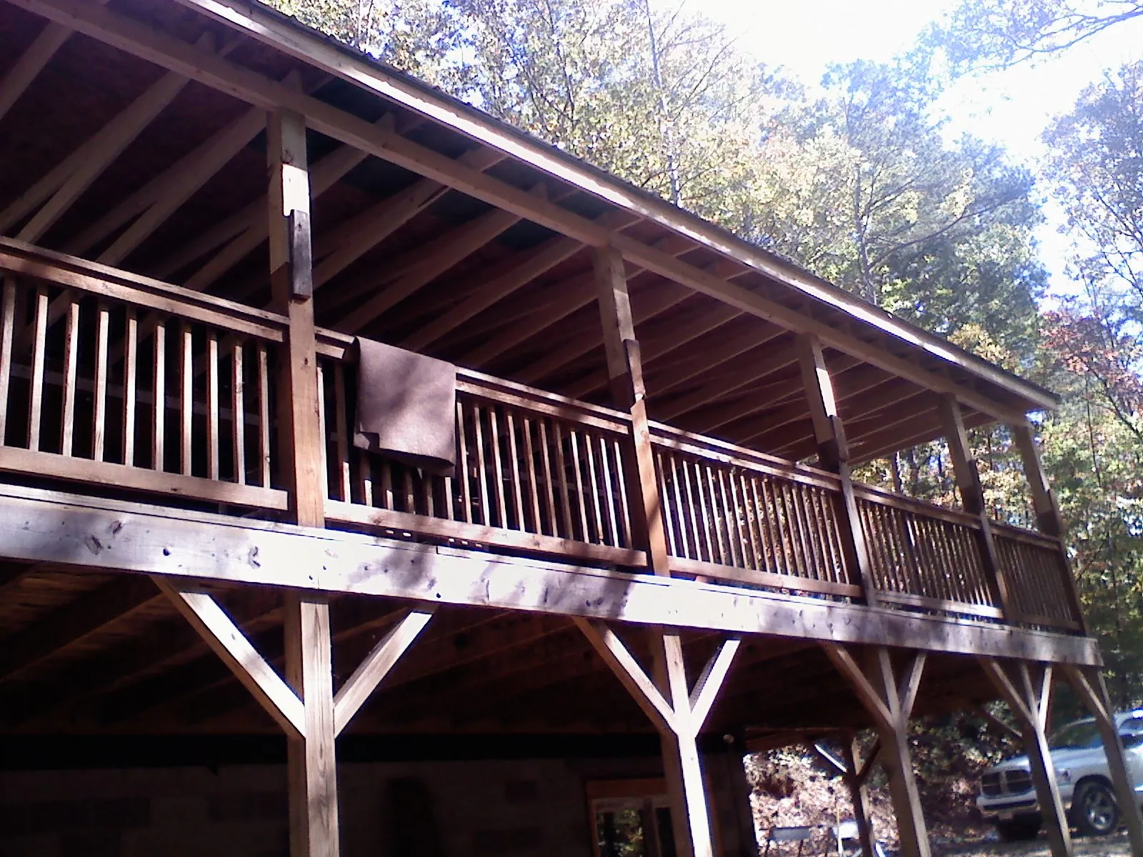 Timber framing under a new elevated porch and deck — Roof Leak Repair in Whitney Point by Roofing Brothers